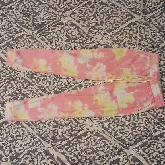 I am selling a medium size, yellow pink and white stitch and pine sweat pants - Picture 1 of 2